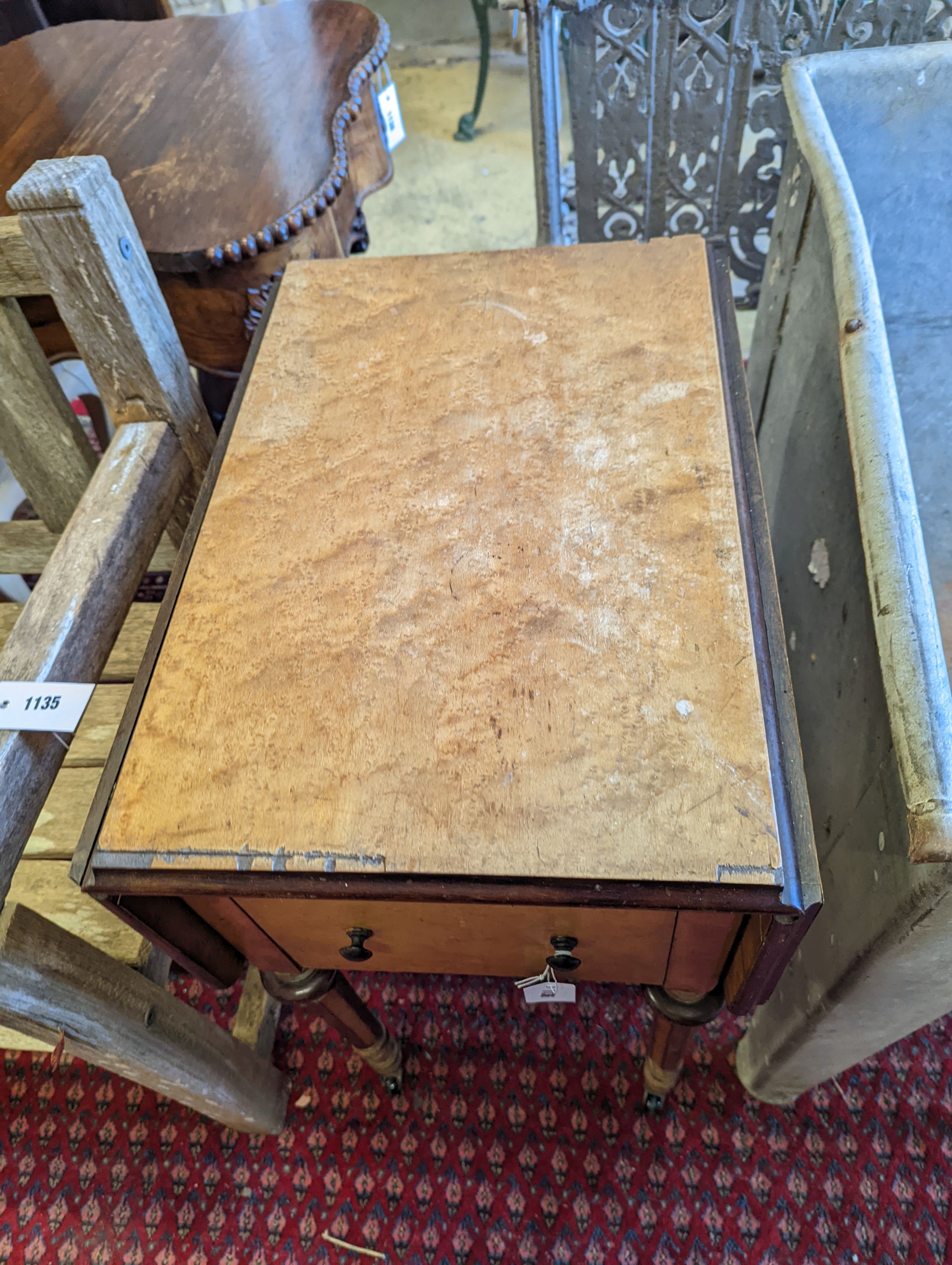 A 19th century Continental bird's eye maple drop flap work table, width 38cm, depth 53cm, height 74cm